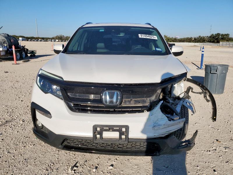 Photo 5 from auction – 2022 HONDA PILOT SE with VIN 5FNYF5H20NB024795