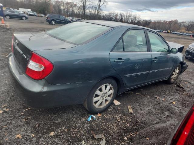 Photo 3 from auction – 2004 TOYOTA CAMRY LE with VIN 4T1BE30K04U273446