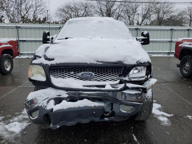 Photo 5 from auction – 2000 FORD F150 with VIN 1FTRX18L3YNB97512