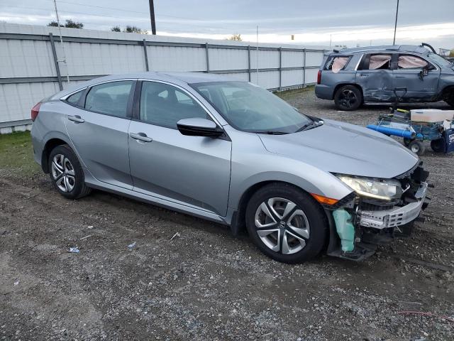 Photo 4 from auction – 2016 HONDA CIVIC LX with VIN 19XFC2F59GE219623