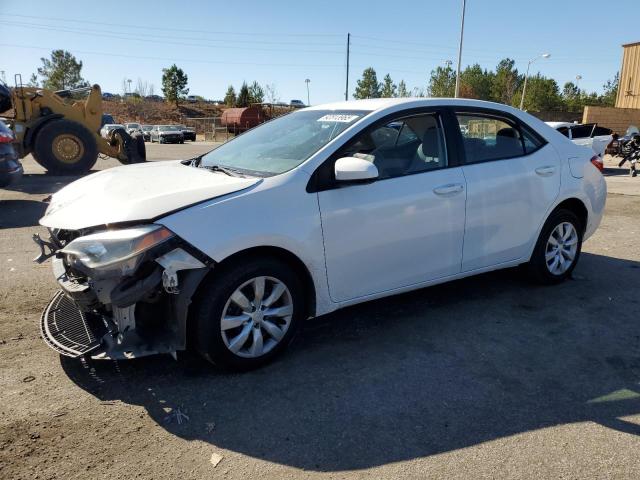 TOYOTA COROLLA L 2014 with VIN 5YFBURHE9EP138828 - Photo from auction