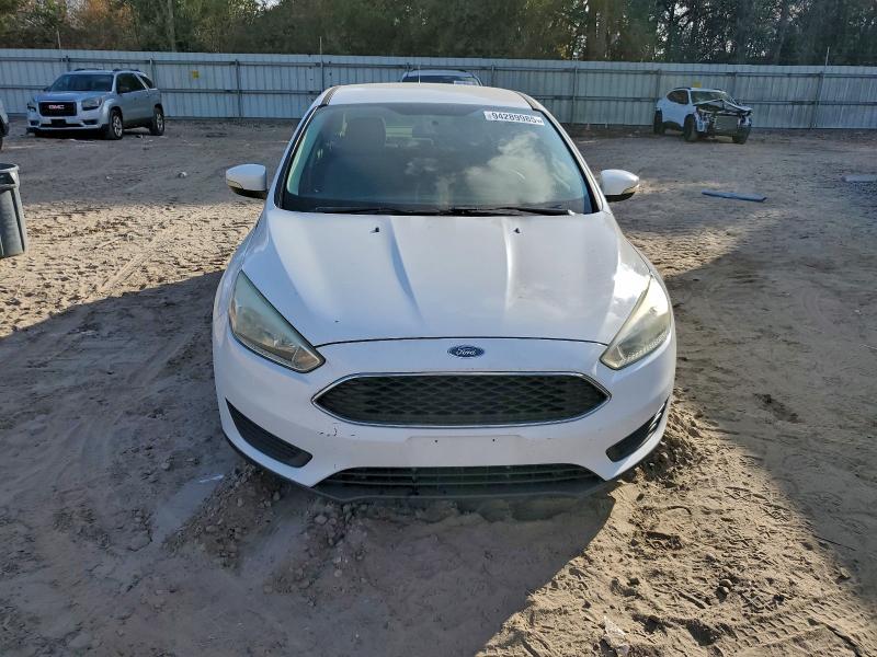 Photo 5 from auction – 2015 FORD FOCUS SE with VIN 1FADP3F28FL344020