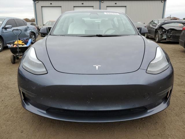 Photo 5 from auction – 2021 TESLA MODEL 3 with VIN 5YJ3E1EA3MF871178