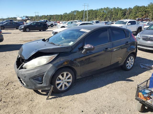 FORD FIESTA 2011 with VIN 3FADP4EJ1BM232084 - Photo from auction