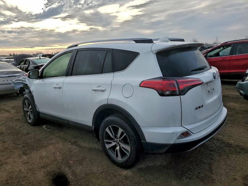 Photo 2 from auction – 2017 TOYOTA RAV4 with VIN JTMWFREV9HJ708917