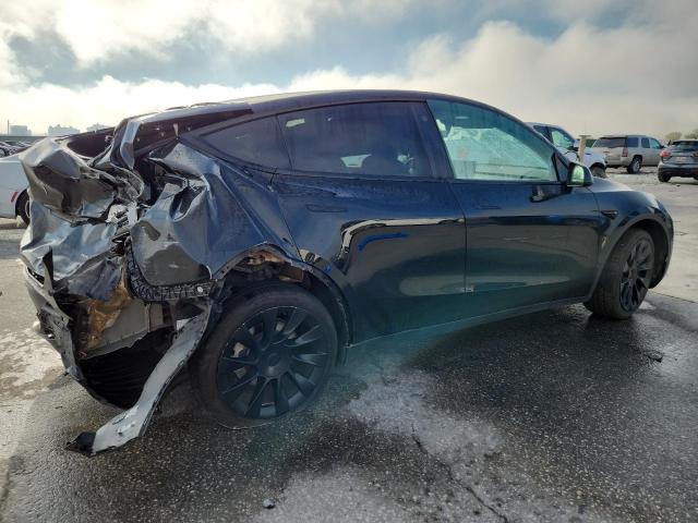 Photo 3 from auction – 2023 TESLA MODEL Y with VIN 7SAYGAEE1PF588675