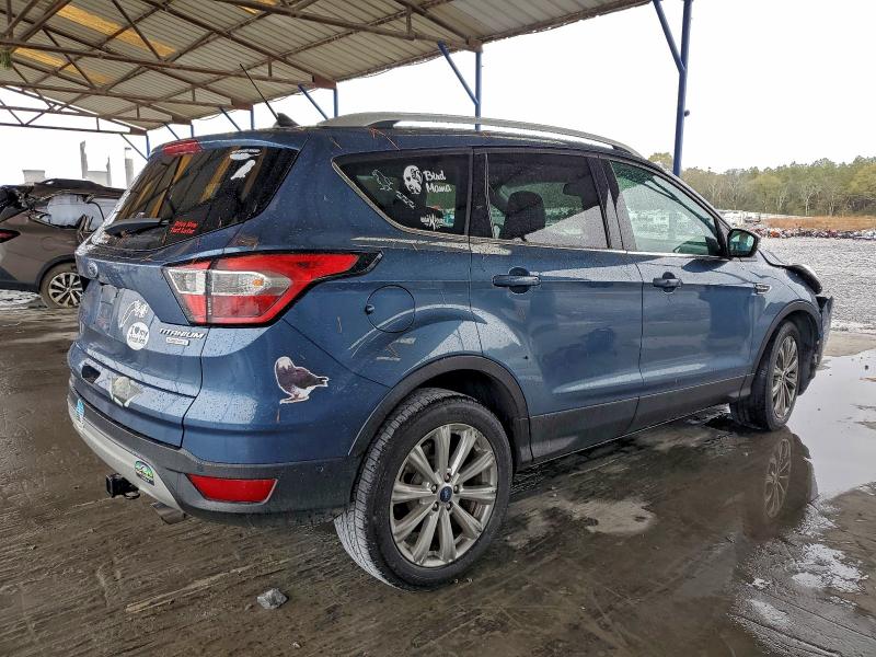 Photo 3 from auction – 2018 FORD ESCAPE TIT with VIN 1FMCU0J98JUC44385