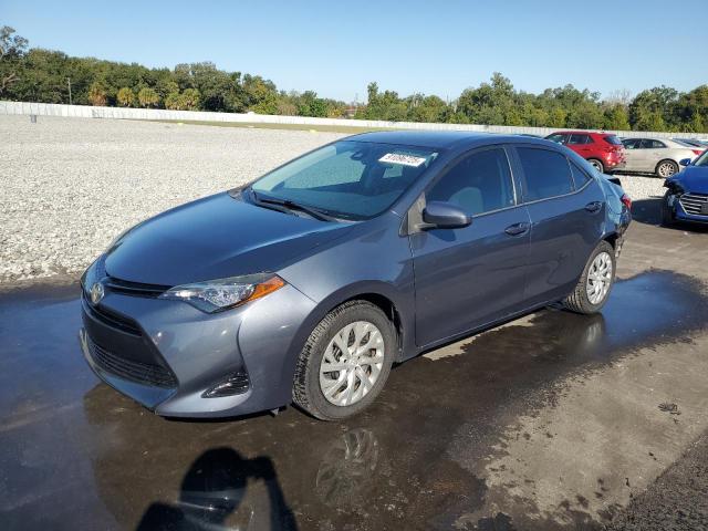 TOYOTA COROLLA L 2017 with VIN 5YFBURHE8HP679924 - Photo from auction