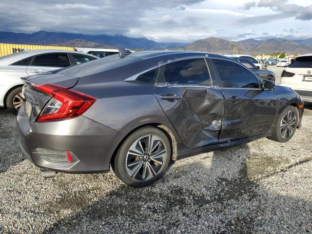 Photo 3 from auction – 2018 HONDA CIVIC EX with VIN JHMFC1F30JX005103