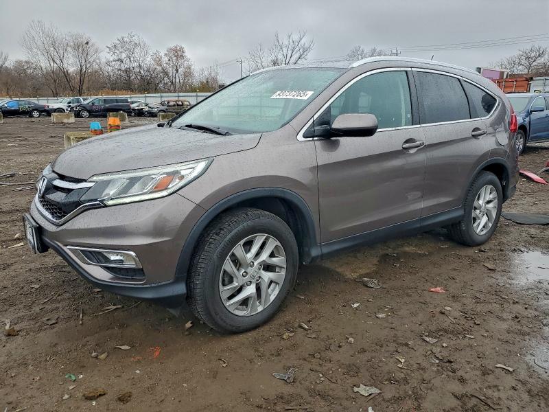 Photo 1 from auction – 2016 HONDA CR-V EXL with VIN 5J6RM4H79GL019279
