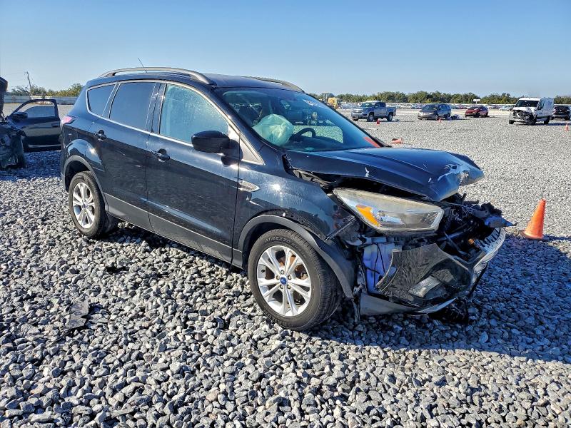 Photo 4 from auction – 2018 FORD ESCAPE SE with VIN 1FMCU0GD2JUB40258