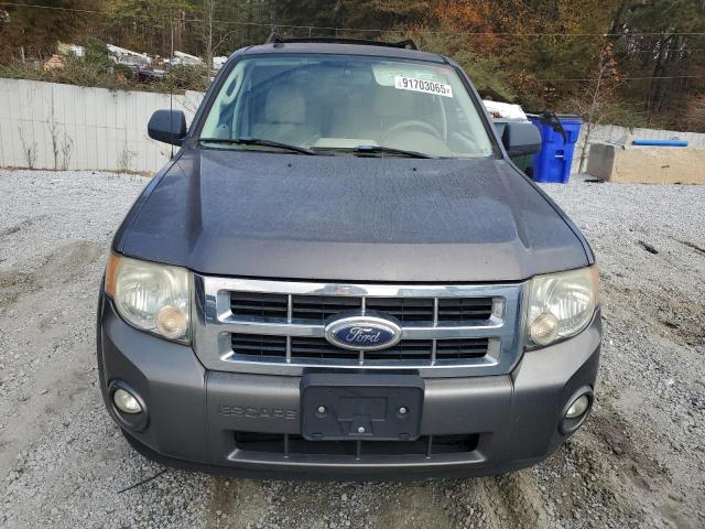 Photo 5 from auction – 2009 FORD ESCAPE with VIN 1FMCU03759KC33797