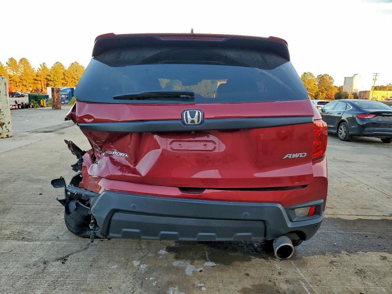 Photo 6 from auction – 2022 HONDA PASSPORT E with VIN 5FNYF8H54NB025010