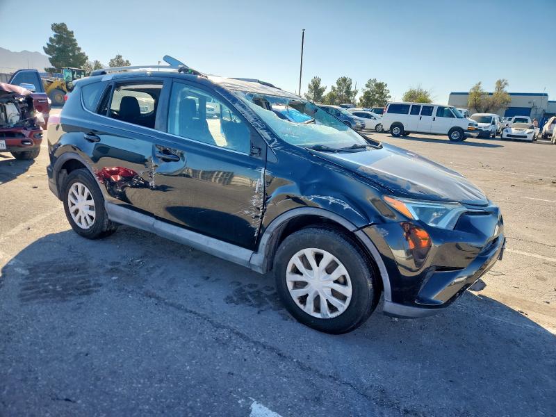 Photo 4 from auction – 2016 TOYOTA RAV4 LE with VIN 2T3BFREV7GW516278
