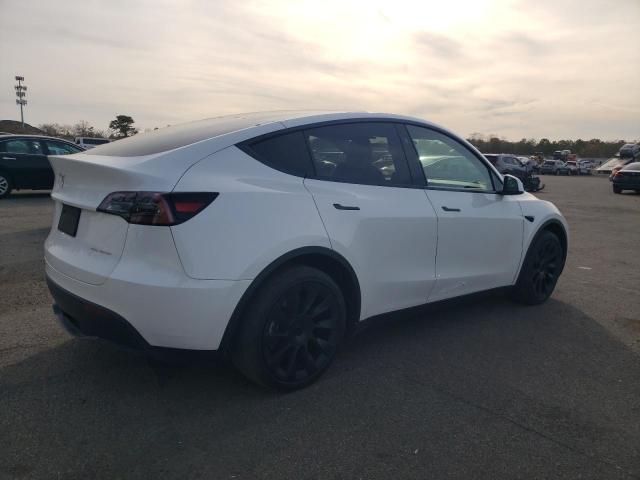 Photo 3 from auction – 2023 TESLA MODEL Y with VIN 7SAYGDEE1PF827997