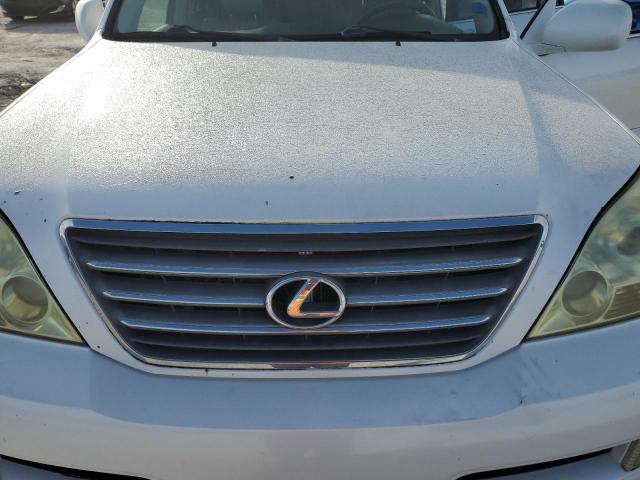 Photo 12 from auction – 2002 LEXUS GX 470 with VIN JTJBT20X770148212