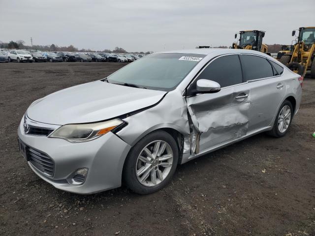 TOYOTA AVALON BAS 2013 with VIN 4T1BK1EB4DU071571 - Photo from auction