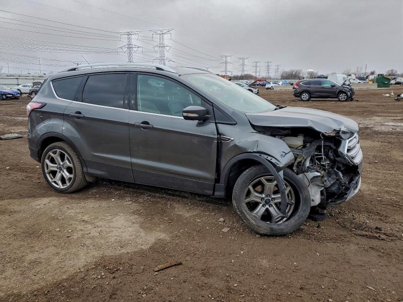 Photo 4 from auction – 2017 FORD ESCAPE TIT with VIN 1FMCU9J9XHUB78694