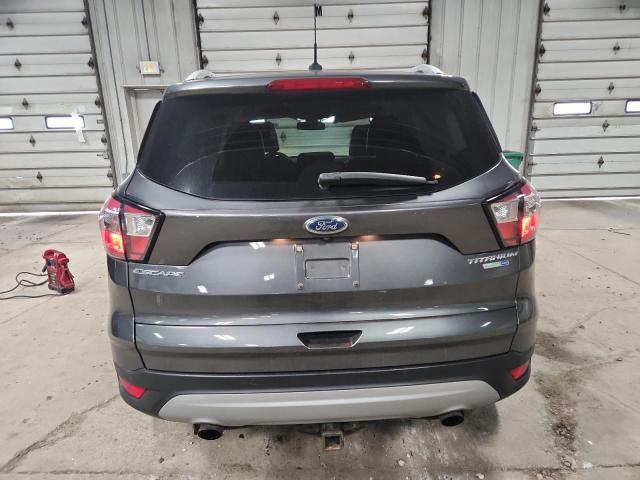 Photo 6 from auction – 2017 FORD ESCAPE TIT with VIN 1FMCU9J92HUD36414