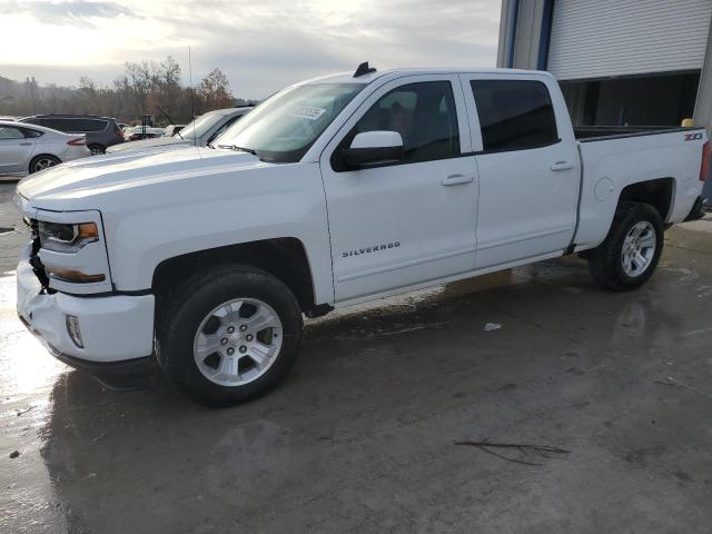 CHEVROLET SILVERADO 2018 with VIN 3GCUKREC9JG614612 - Photo from auction