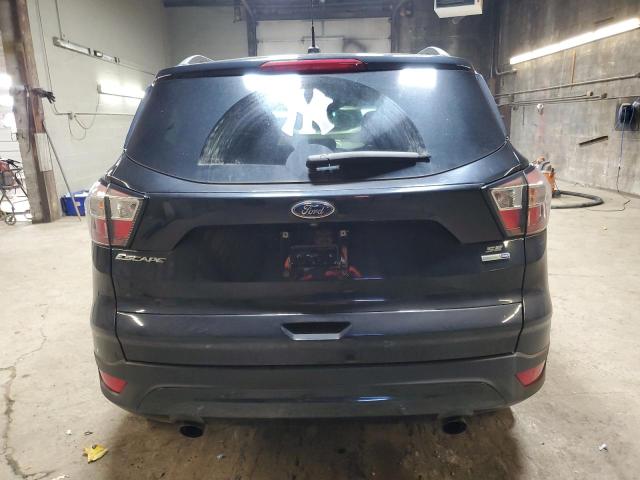 Photo 6 from auction – 2018 FORD ESCAPE SE with VIN 1FMCU9GD7JUC16352