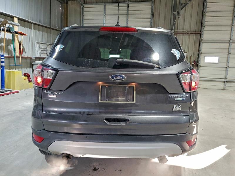 Photo 6 from auction – 2018 FORD ESCAPE TIT with VIN 1FMCU9J96JUC34989