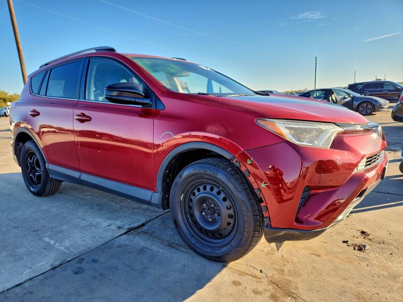 Photo 4 from auction – 2017 TOYOTA RAV4 LE with VIN JTMZFREV3HJ146459