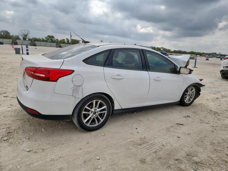 Photo 3 from auction – 2016 FORD FOCUS SE with VIN 1FADP3F28GL359943