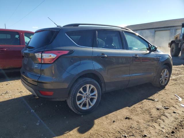Photo 3 from auction – 2018 FORD ESCAPE SE with VIN 1FMCU9GD4JUB52142