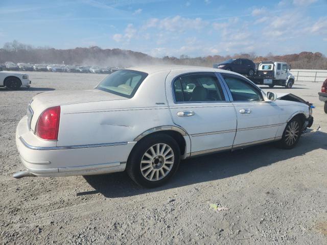 Photo 3 from auction – 2004 LINCOLN TOWN CAR E with VIN 1LNHM81W94Y619062