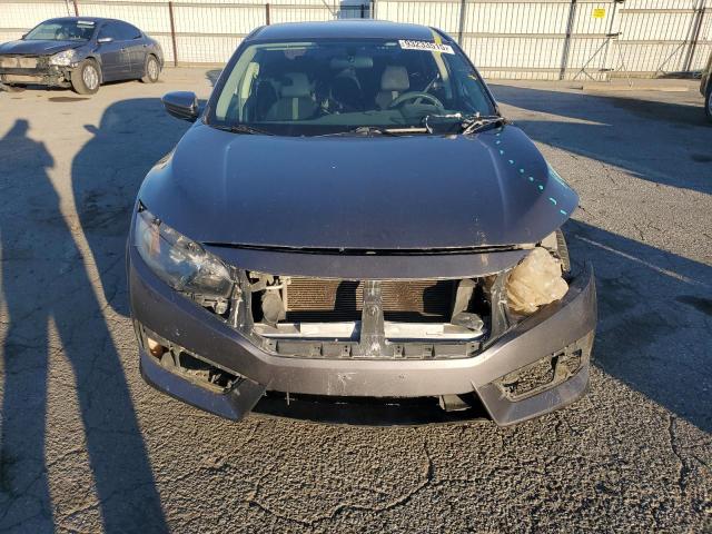 Photo 5 from auction – 2016 HONDA CIVIC LX with VIN 19XFC2F52GE018596