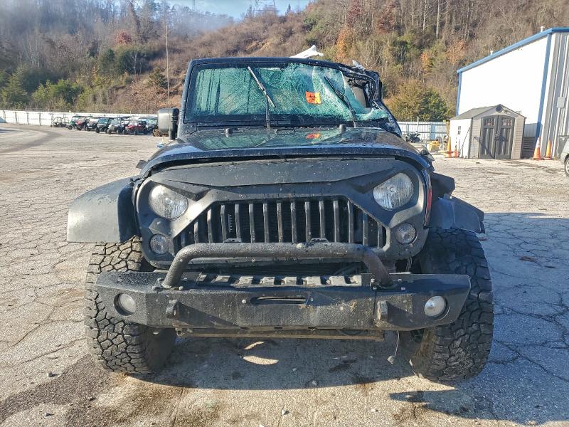 Photo 5 from auction – 2014 JEEP WRANGLER U with VIN 1C4BJWDG4EL185871