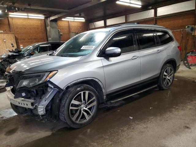 HONDA PILOT ELIT 2016 with VIN 5FNYF6H02GB105465 - Photo from auction