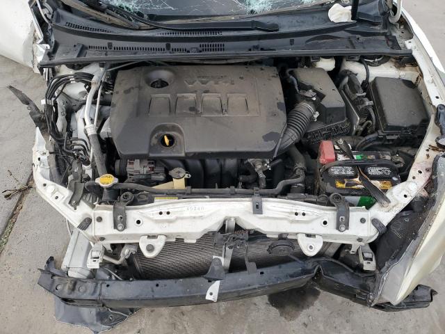 Photo 11 from auction – 2014 TOYOTA COROLLA L with VIN 5YFBURHE9EP070904
