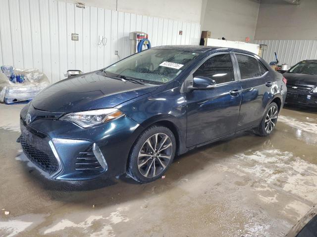 TOYOTA COROLLA L 2017 with VIN 2T1BURHE4HC911029 - Photo from auction