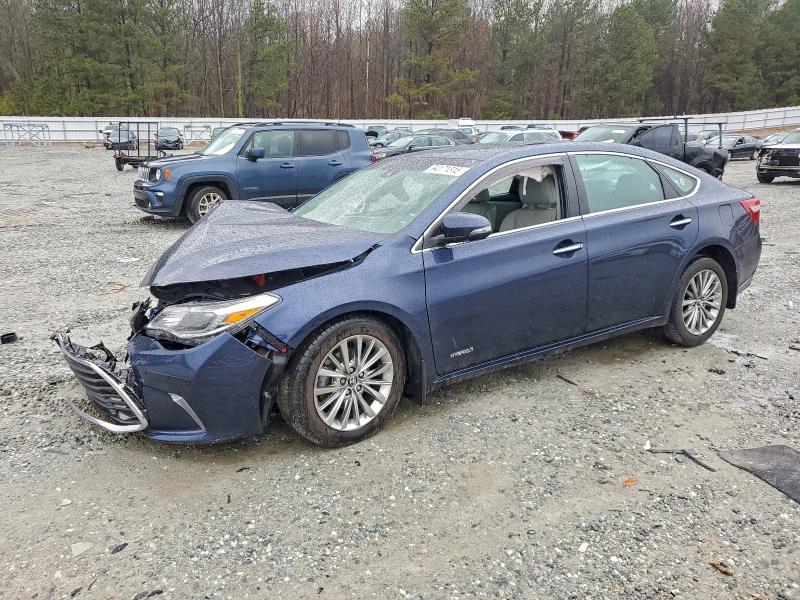 TOYOTA AVALON HYB 2018 with VIN 4T1BD1EB0JU060430 - Photo from auction