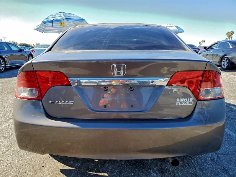 Photo 6 from auction – 2010 HONDA CIVIC LX with VIN 19XFA1F54AE006151