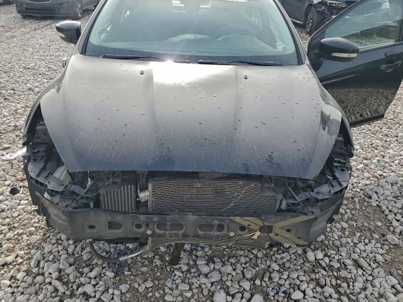 Photo 11 from auction – 2016 FORD FOCUS SE with VIN 1FADP3FE9GL200052