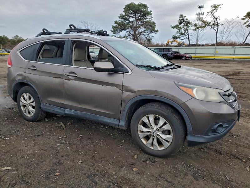Photo 4 from auction – 2013 HONDA CR-V with VIN 5J6RM4H71DL017179