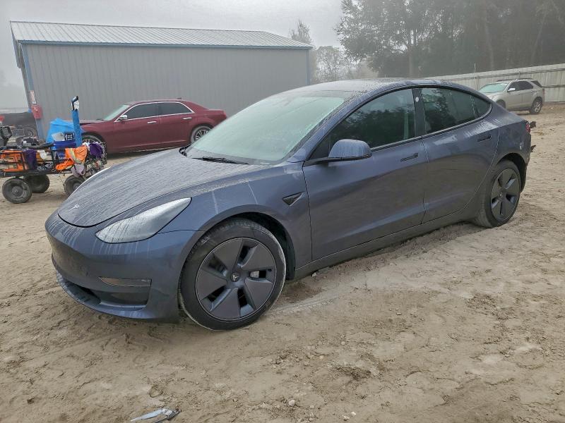 TESLA MODEL 3 2023 with VIN 5YJ3E1EA9PF706322 - Photo from auction