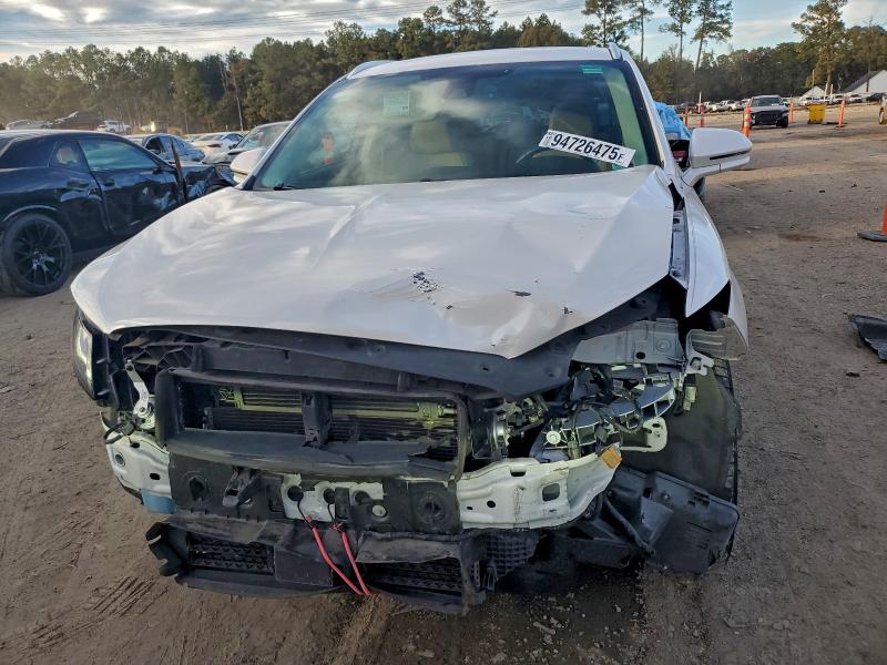 Photo 5 from auction – 2019 LINCOLN MKC RESERV with VIN 5LMCJ3C99KUL34649