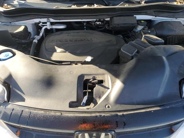 Photo 11 from auction – 2021 HONDA PILOT SE with VIN 5FNYF6H2XMB026607