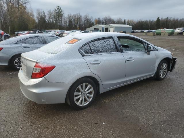 Photo 3 from auction – 2012 HONDA CIVIC EXL with VIN 2HGFB2F99CH113615