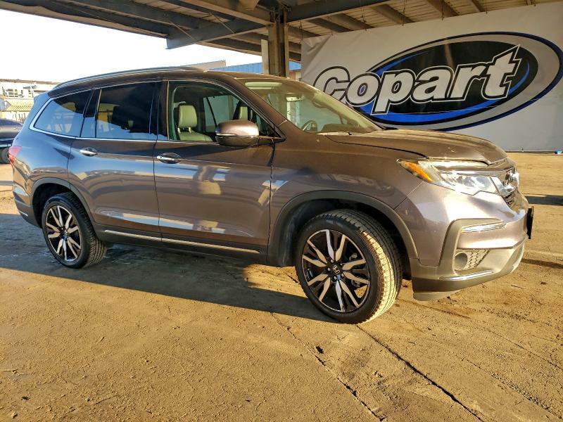 Photo 4 from auction – 2021 HONDA PILOT TOUR with VIN 5FNYF6H66MB005790