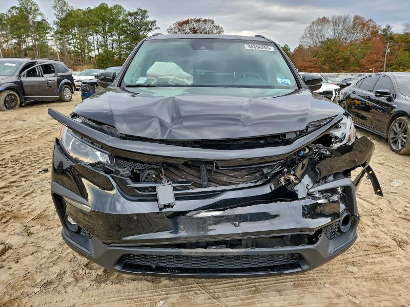 Photo 5 from auction – 2022 HONDA PILOT SE with VIN 5FNYF6H2XNB094570