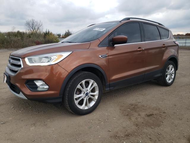 FORD ESCAPE SE 2017 with VIN 1FMCU9GD5HUC21656 - Photo from auction