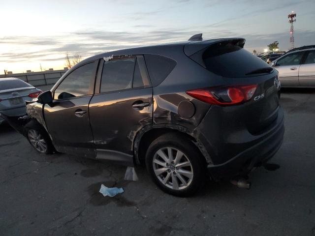 Photo 2 from auction – 2014 MAZDA CX-5 SPORT with VIN JM3KE2BE0E0412366