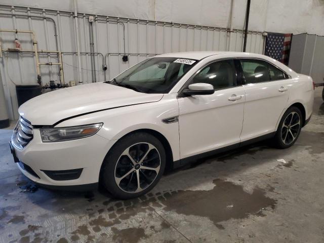 FORD TAURUS SEL 2014 with VIN 1FAHP2H81EG137876 - Photo from auction