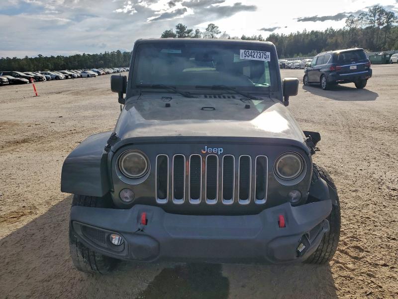 Photo 5 from auction – 2016 JEEP WRANGLER U with VIN 1C4BJWEG3GL145038