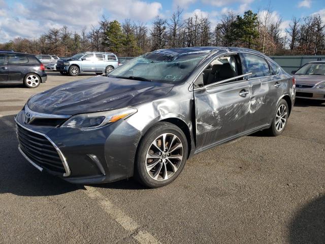 TOYOTA AVALON XLE 2016 with VIN 4T1BK1EB8GU233058 - Photo from auction